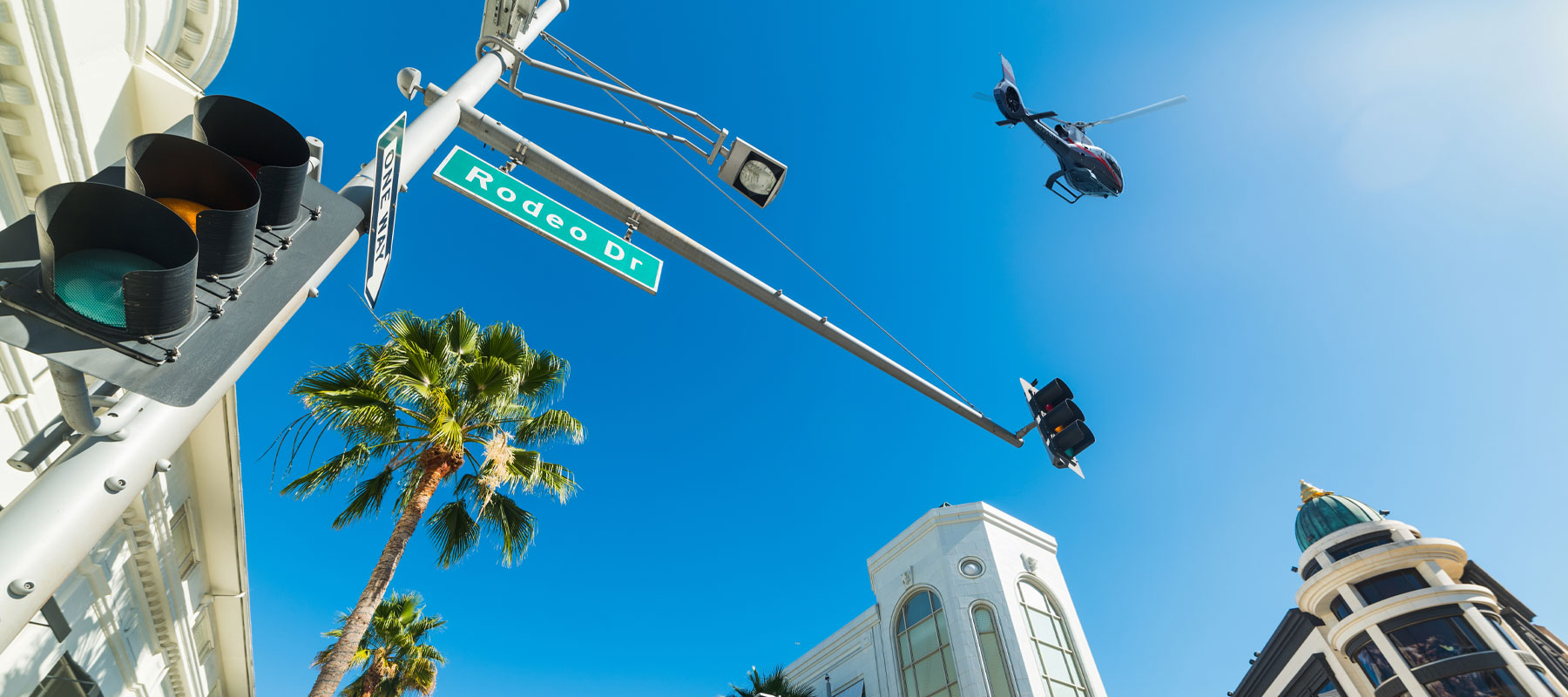 Palm trees and blue sky above Rodeo Drive in Beverly Hills