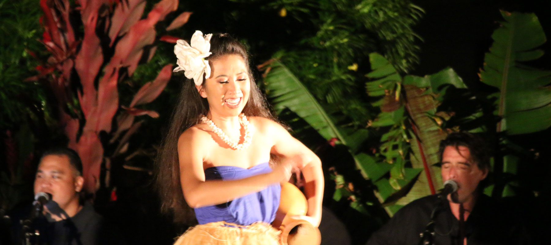 Traditional Hawaiian hula dancer at a Maui luau experience
