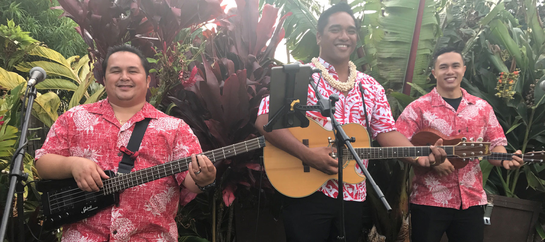Live Polynesian musicians performing during a Maui Luau experience