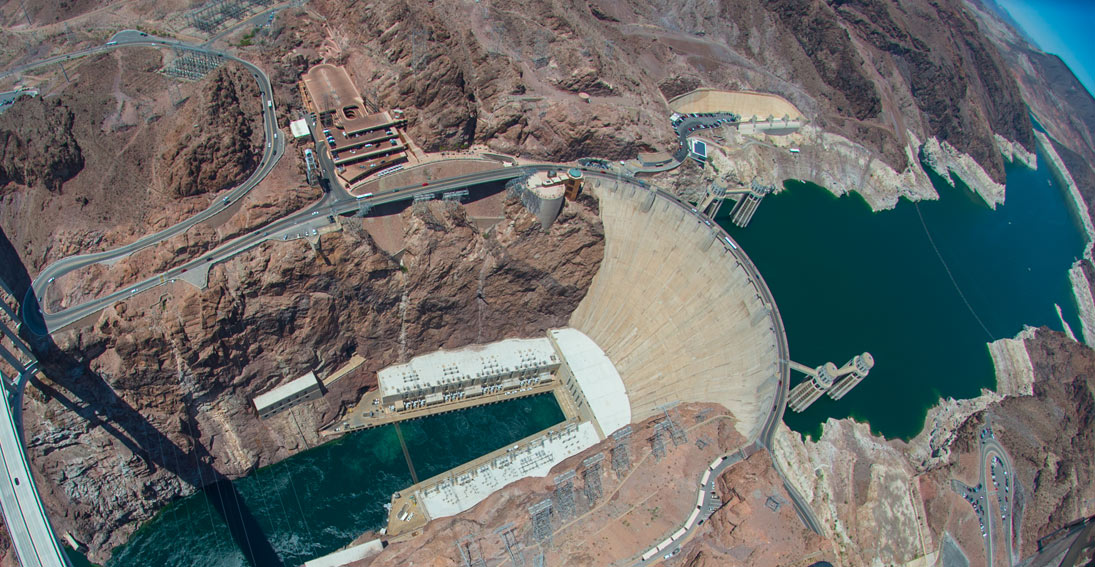 Fly over the iconic Hoover Dam on your way to the Grand Canyon