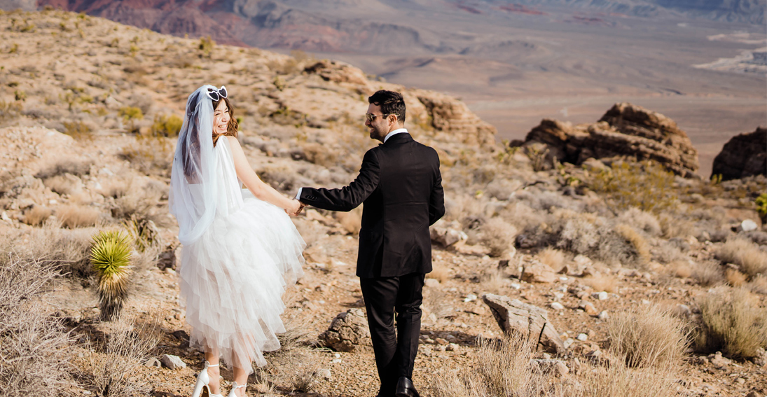 Couple's romantic private landing wedding with breathtaking Red Rock Canyon views